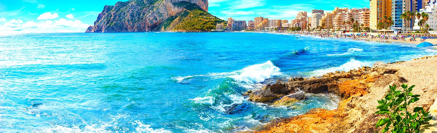 Looking down a spanish beachfront town