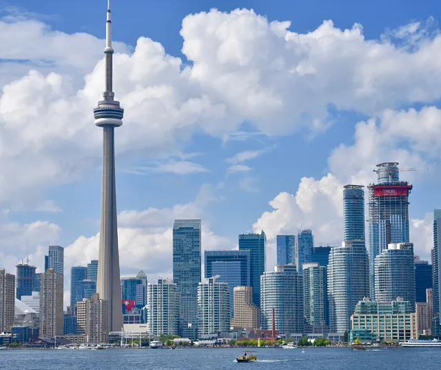 looking at the toronto skyline in the day